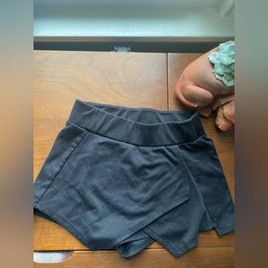 Used black skort, stretchy material. No tag.